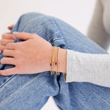 Birthstone Cubic Zirconia Baguette Bracelets in 14K gold over sterling silver by Skōsh Jewelry