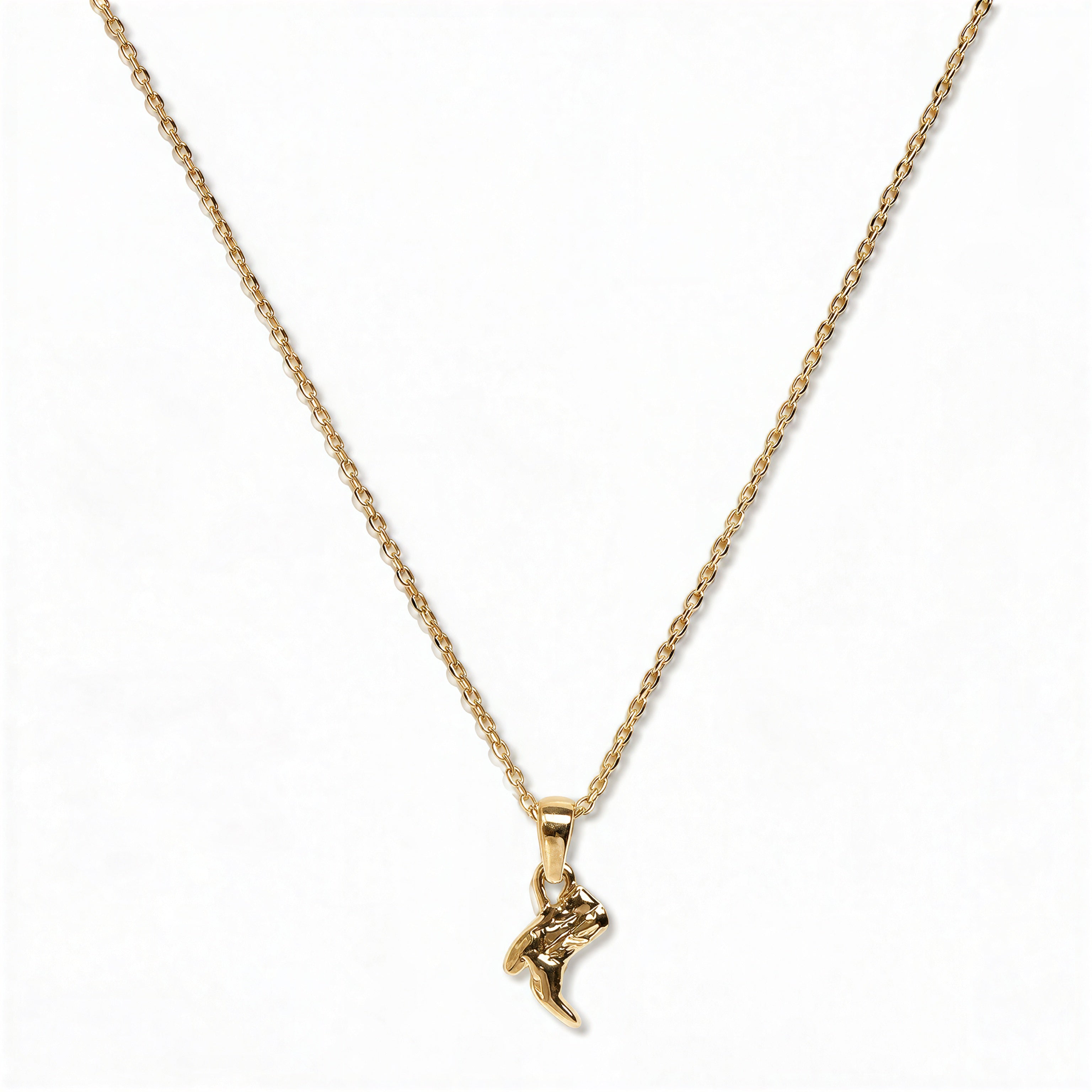 A Cowgirl Boot Pendant Necklace by Skōsh Jewelry, featuring a detailed cowgirl boot pendant on a fine gold chain, displayed against a white background.