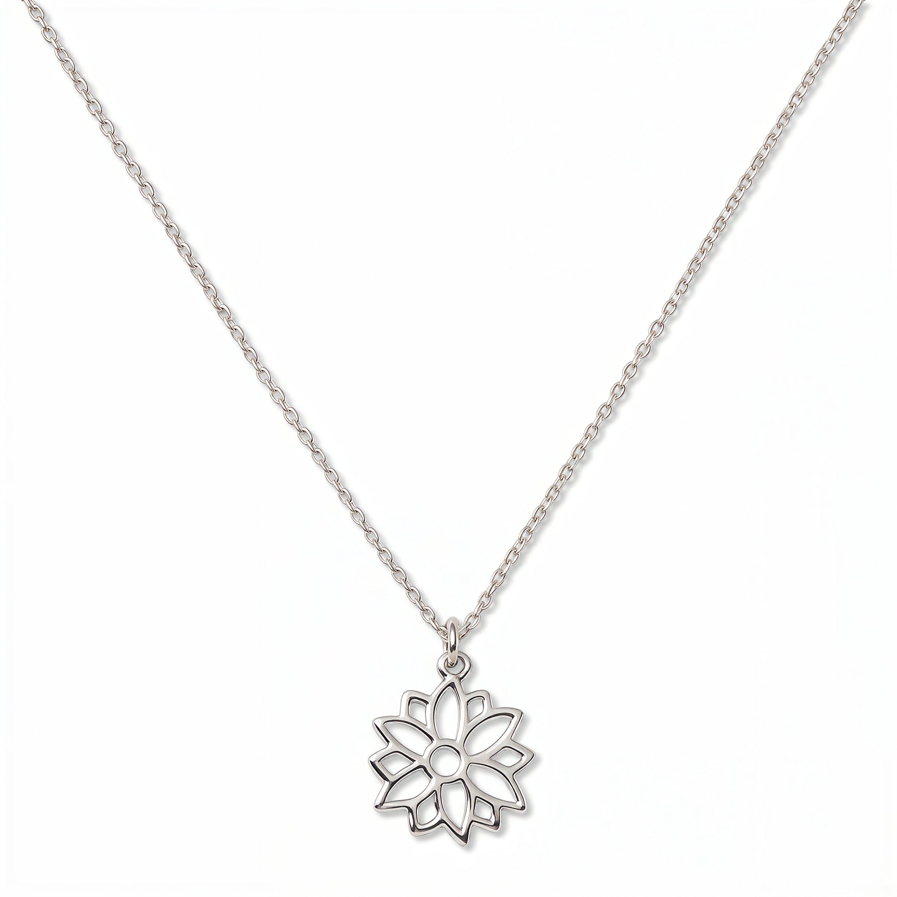 A Poinsettia December Flower Pendant Necklace by Skōsh Jewelry, featuring an open cutout poinsettia flower pendant on a fine sterling silver chain, displayed against a white background.