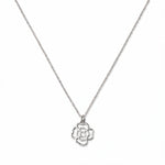 A Violet February Flower Pendant Necklace by Skōsh Jewelry, featuring an open cutout violet flower pendant on a fine sterling silver chain, displayed against a white background.