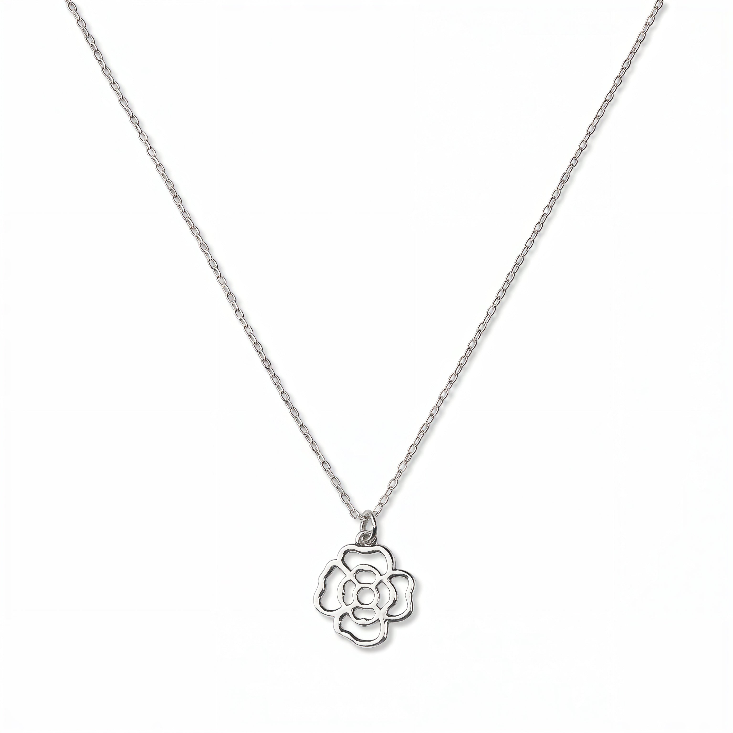 A Violet February Flower Pendant Necklace by Skōsh Jewelry, featuring an open cutout violet flower pendant on a fine sterling silver chain, displayed against a white background.