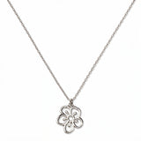 A Hawthorn May Flower Pendant Necklace by Skōsh Jewelry, featuring an open cutout hawthorn flower pendant on a fine sterling silver chain, displayed against a white background.
