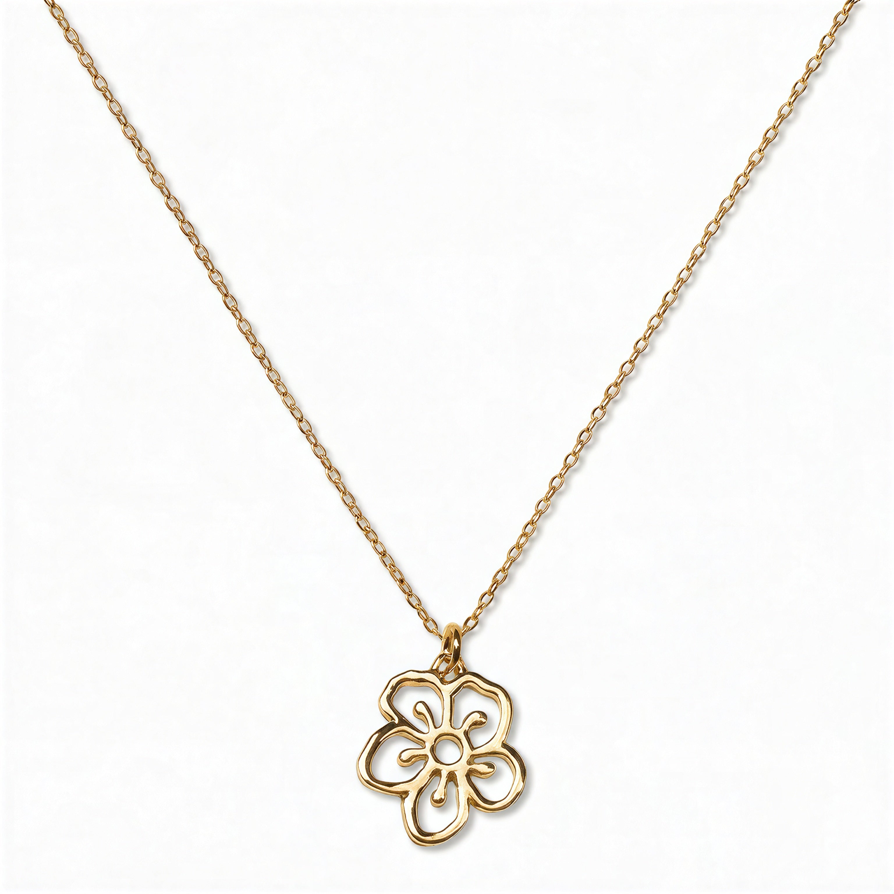 A Hawthorn May Flower Pendant Necklace by Skōsh Jewelry, featuring an open cutout hawthorn flower pendant on a fine gold chain, displayed against a white background.