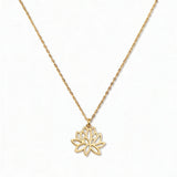 A Water Lily July Flower Pendant Necklace by Skōsh Jewelry, featuring an open cutout water lily flower pendant on a fine gold chain, displayed against a white background.