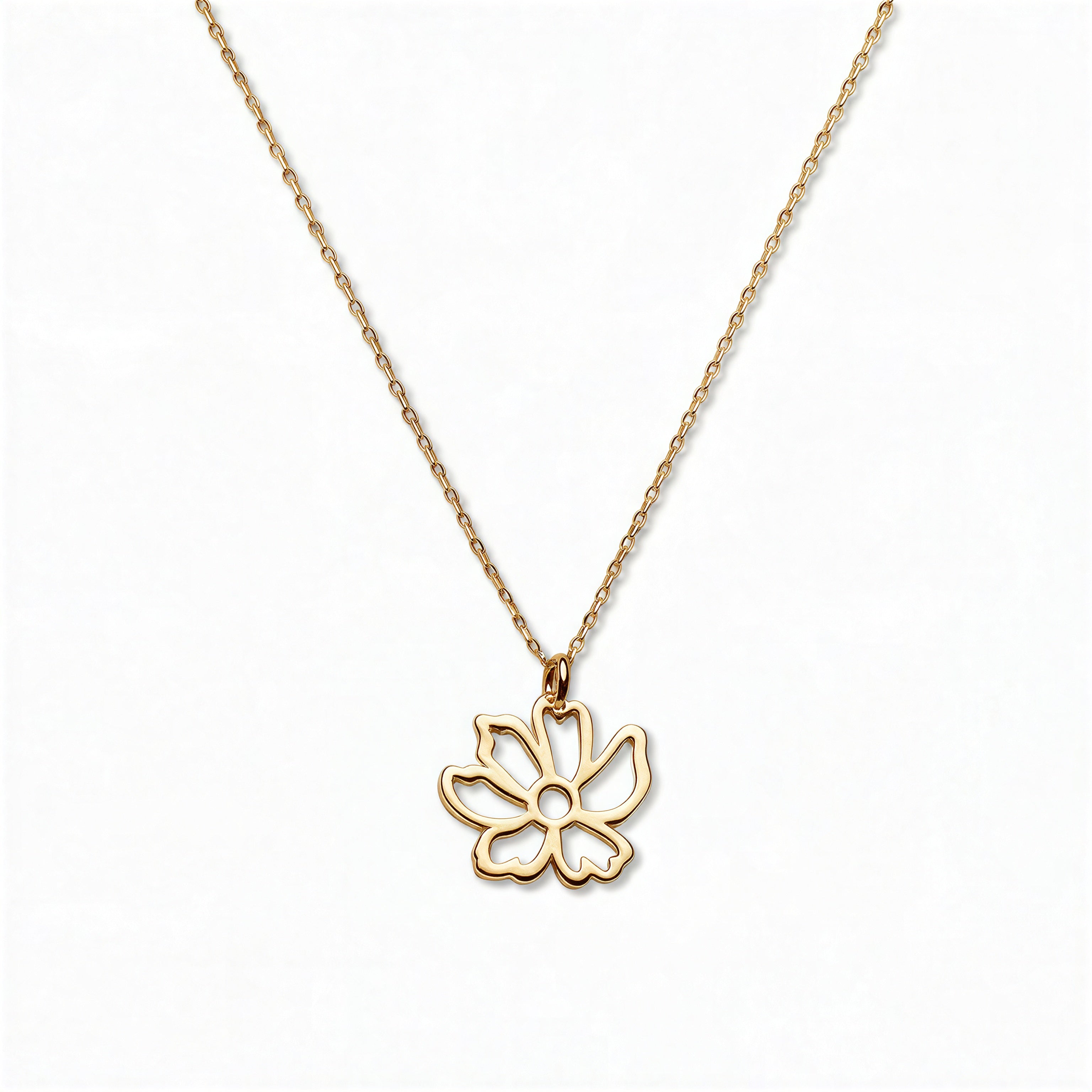 A Poppy August Flower Pendant Necklace by Skōsh Jewelry, featuring an open cutout poppy flower pendant on a fine gold chain, displayed against a white background.