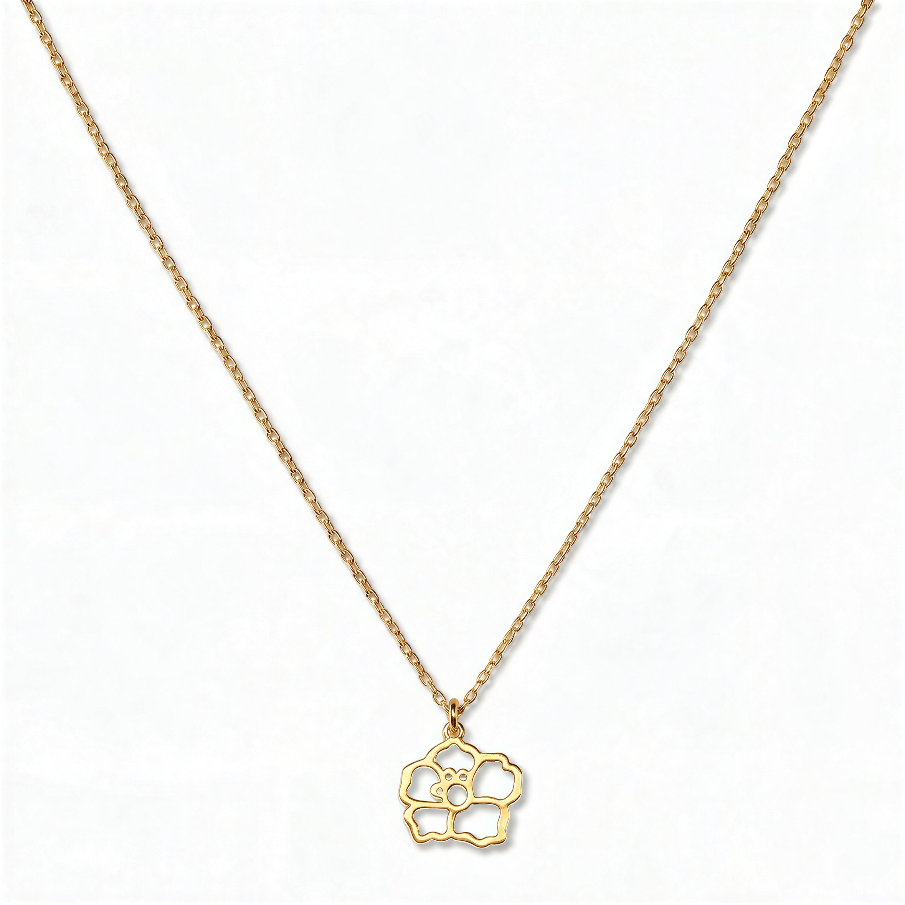 A Morning Glory September Flower Pendant Necklace by Skōsh Jewelry, featuring an open cutout morning glory flower pendant on a fine gold chain, displayed against a white background.