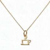 A Morning Brew Coffee Cup Pendant Necklace by Skōsh Jewelry, featuring an open outline of a coffee cup with steam on a fine gold chain, displayed against a white background.