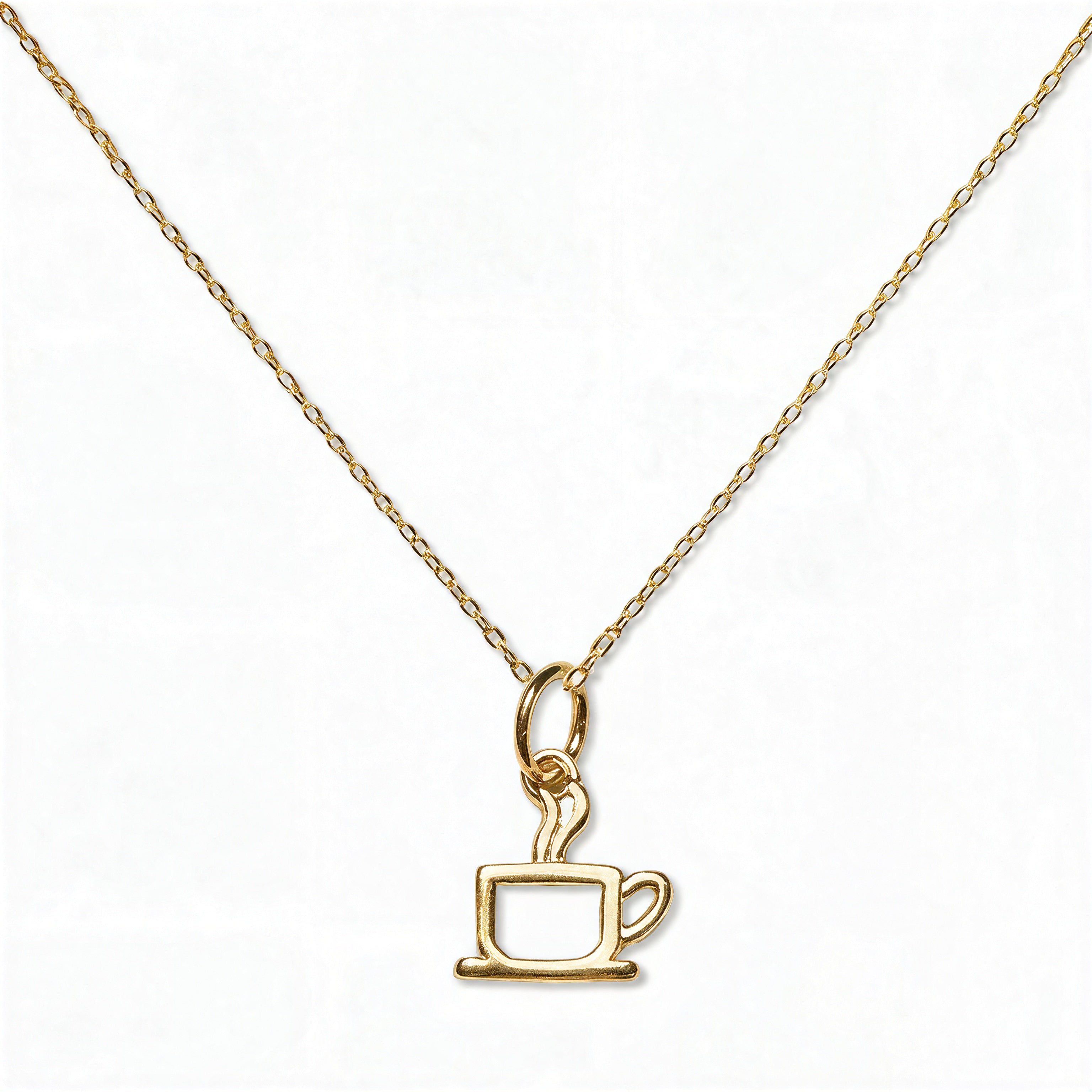 A Morning Brew Coffee Cup Pendant Necklace by Skōsh Jewelry, featuring an open outline of a coffee cup with steam on a fine gold chain, displayed against a white background.