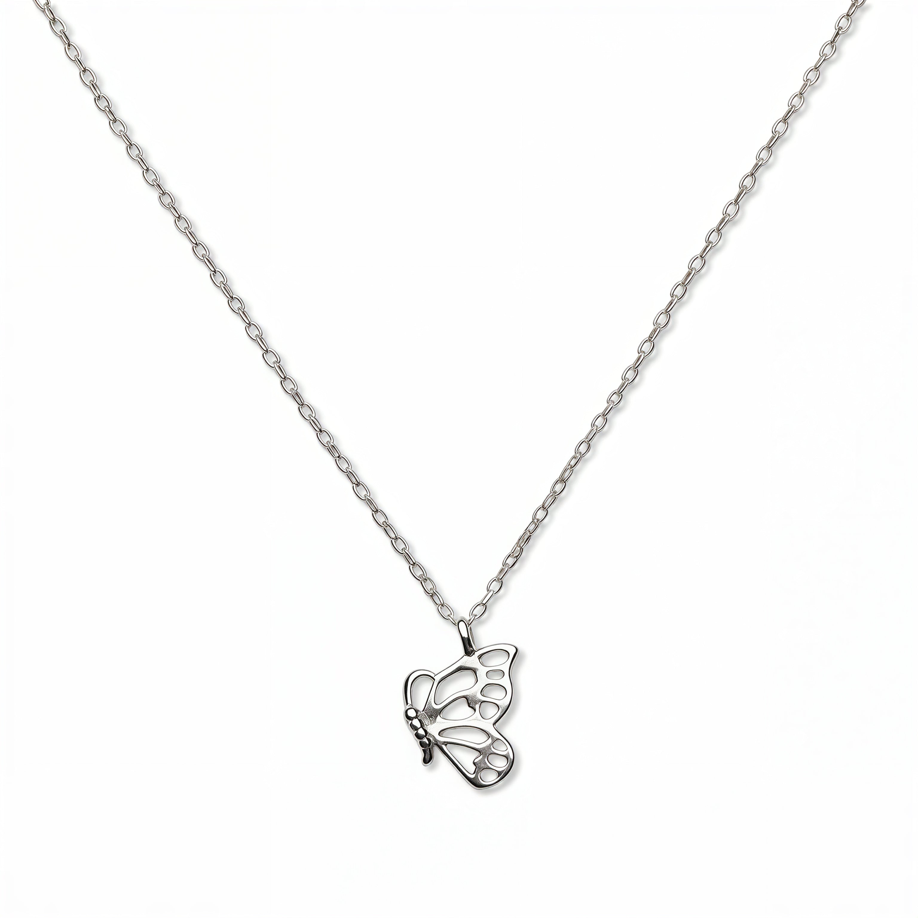 A Hope Butterfly Pendant Necklace by Skōsh Jewelry, featuring a small butterfly pendant on a fine sterling silver chain, displayed against a white background.