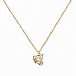 A Hope Butterfly Pendant Necklace by Skōsh Jewelry, featuring a small butterfly pendant on a fine gold chain, displayed against a white background.