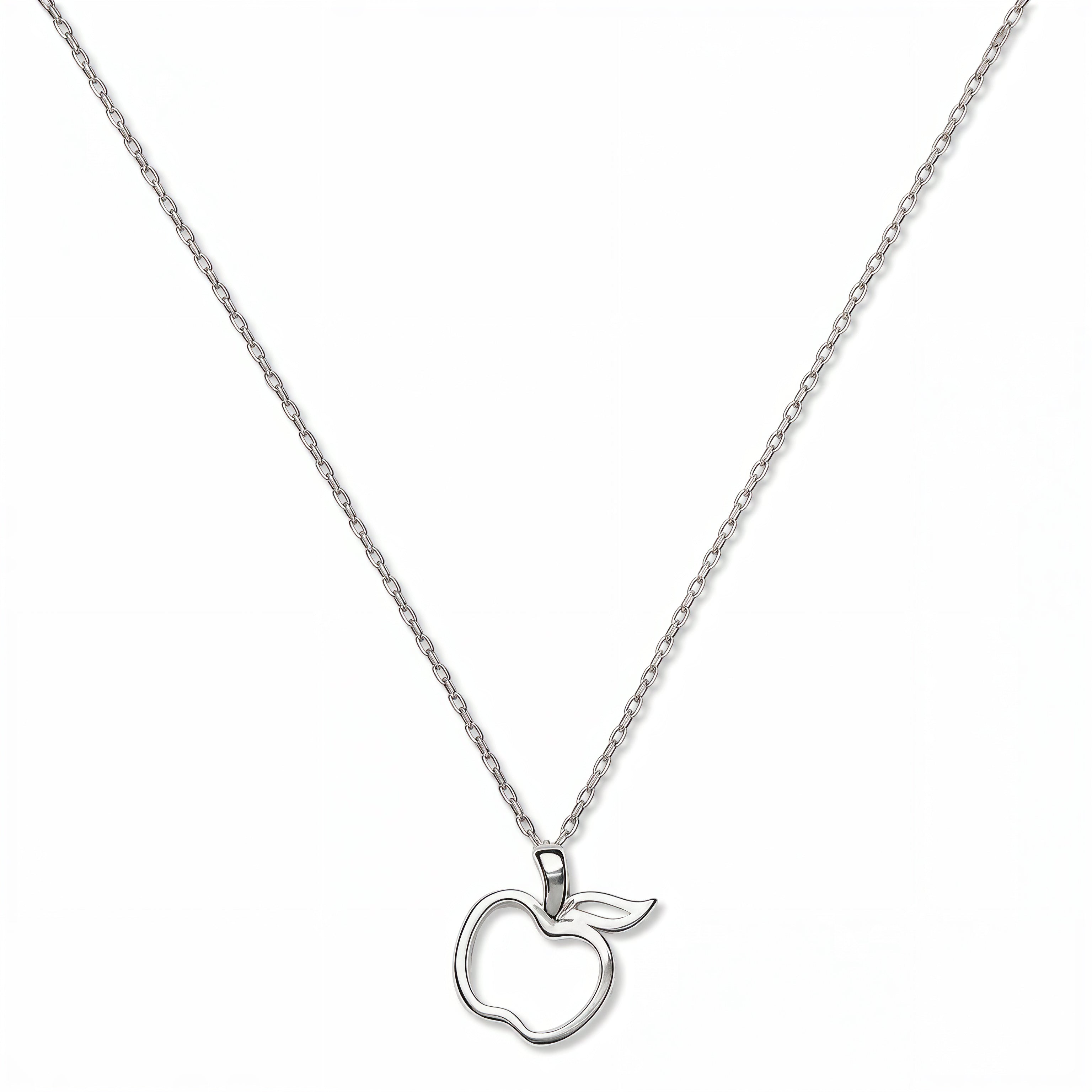 A Cut Out Apple Pendant Necklace by Skōsh Jewelry, featuring an open cutout outline of an apple on a fine sterling silver chain, displayed against a white background.