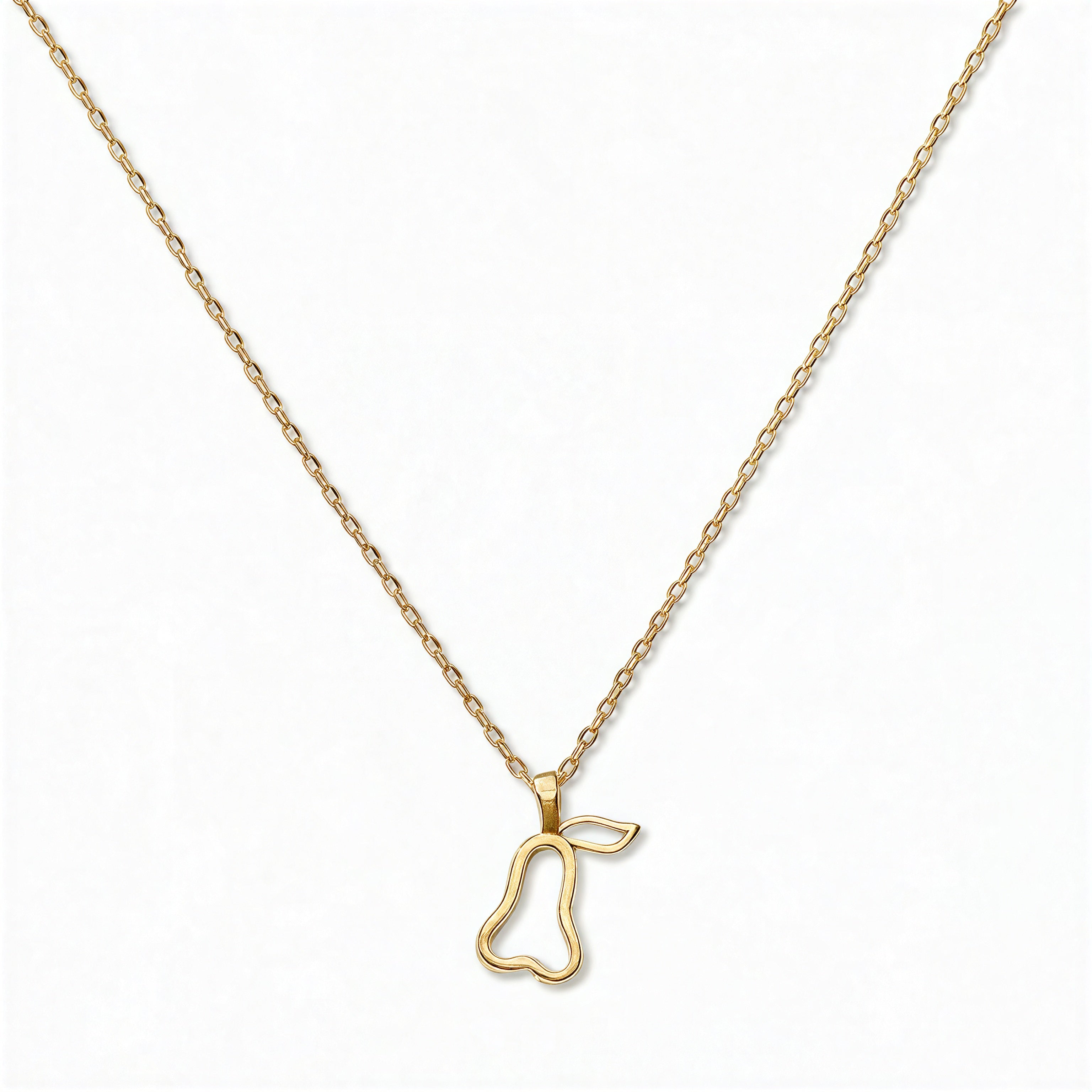 A Pear Pendant Necklace by Skōsh Jewelry, featuring an open outline of a pear on a fine gold chain, displayed against a white background.