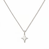 A Starlight Pendant Necklace by Skōsh Jewelry, featuring a sleek four-point star pendant on a fine sterling silver chain, displayed against a white background.